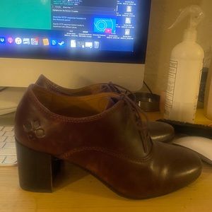 Brown genuine leather lace up booties. Nearly new condition.